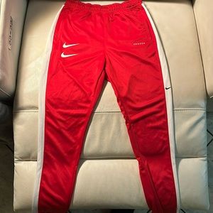 Red Nike pants
